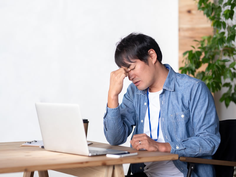 自律神経障害に悩む40代男性の写真